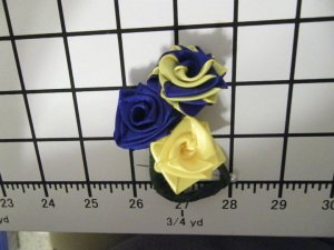 Blue & Yellow mini rose corsage